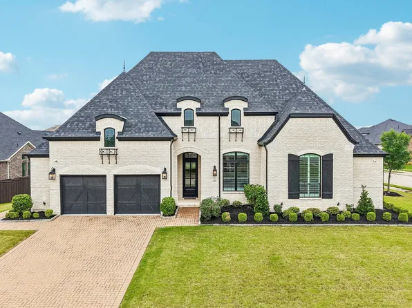 A French-eclectic style home in a Prosper, Texas neighborhood